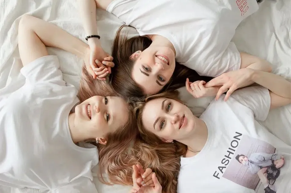 Three women lying down