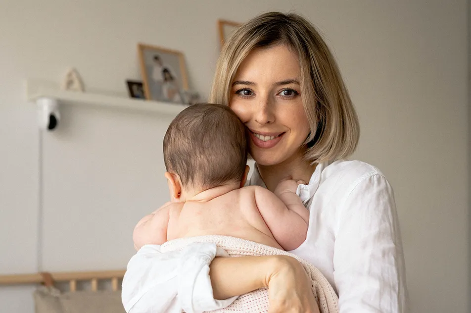 mother holding her baby