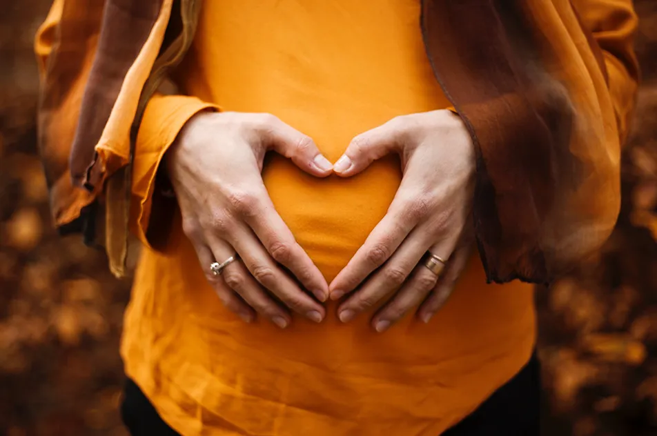 woman touching stomach